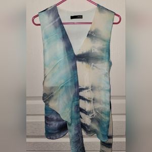 Blue and white sleeveless top